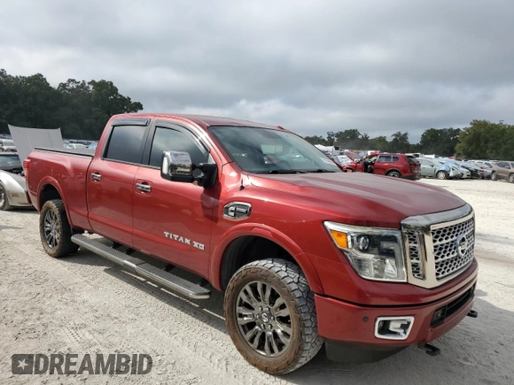 2016 Nissan Titan Platinum Reserve z VIN 1N6BA1F26GN504857, wystawiony jako Copart lot #78143964 z przebiegiem 114 257 mil mil oraz Szkoda całkowita • Salvage title. Historia ofert i sprzedaży dostępna na DreamBid. Obrazek 4.