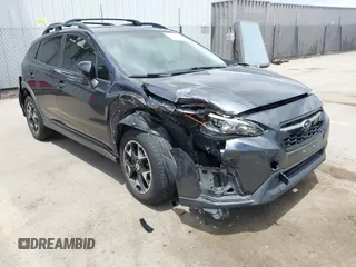 2018 Subaru Crosstrek Premium z VIN JF2GTACC9JH215303, wystawiony jako IAAI lot #42228185 z przebiegiem 71 170 mil mil oraz . Historia ofert i sprzedaży dostępna na DreamBid. Obrazek 6.