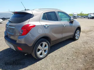 2015 Buick Encore with VIN KL4CJASB5FB036319, listed as a IAAI auction lot 42242748 with 106,579 mi miles and . Bid and sale history available at DreamBid. Image 4.