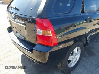 2007 Kia Sportage LX with VIN KNDJF724877313178, listed as a IAAI auction lot 41863492 with 199,138 mi miles. Bid and sale history available at carsss.com. Image 17.