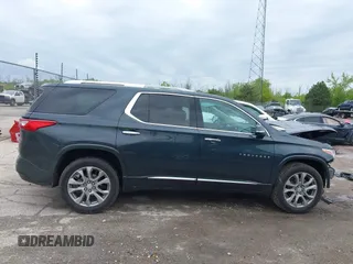 2018 Chevrolet Traverse Premier z VIN 1GNEVJKW4JJ240024, wystawiony jako IAAI lot #42369659 z przebiegiem 160 147 mil mil oraz . Historia ofert i sprzedaży dostępna na DreamBid. Obrazek 14.