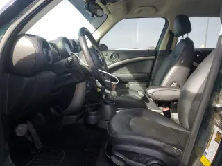 2013 MINI Countryman with VIN WMWZB3C54DWM09421, listed as a Copart auction lot 85136324 with 110,615 mi miles and Salvage title. Bid and sale history available at DreamBid. Image 7.