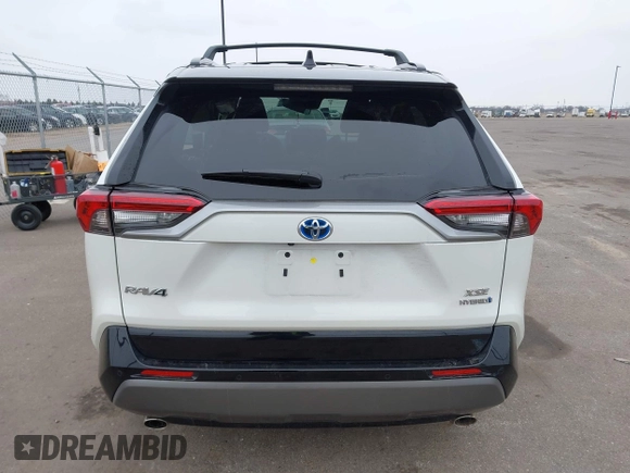 2021 Toyota RAV4 Hybrid XSE with VIN 2T3E6RFV4MW021009, listed as a IAAI auction lot 41940278 with 33,016 mi miles and . Bid and sale history available at DreamBid. Image 16.