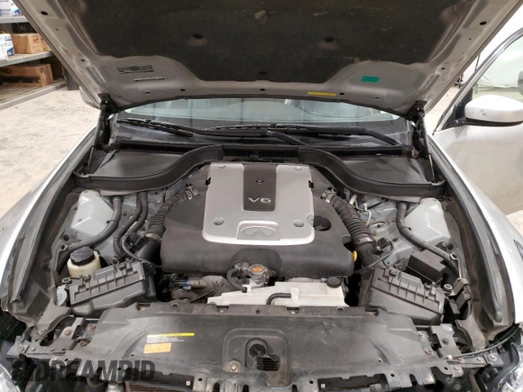 2012 Infiniti G25 x z VIN JN1DV6AR5CM731428, wystawiony jako Copart lot #51522215 z przebiegiem 141 575 mil mil oraz Nie do naprawy • Non repairable. Historia ofert i sprzedaży dostępna na DreamBid. Obrazek 11.
