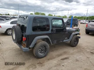 2003 Jeep Wrangler Sport z VIN 1J4FA49S13P374688, wystawiony jako Copart lot #58296735 z przebiegiem 184 554 mil mil oraz Czysty tytuł • Clean title. Historia ofert i sprzedaży dostępna na DreamBid. Obrazek 3.