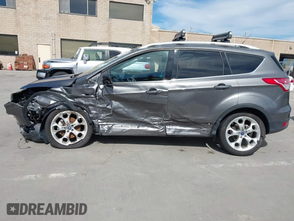 2013 Ford Escape Titanium with VIN 1FMCU0J91DUD39570, listed as a IAAI auction lot 42014892 with 55,184 mi miles and . Bid and sale history available at DreamBid. Image 14.