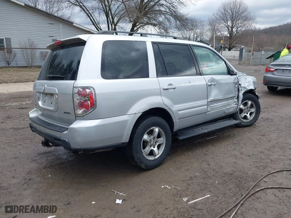 2006 Honda Pilot EX with VIN 2HKYF18426H553632, listed as a IAAI auction lot 41656610 with 154,470 mi miles. Bid and sale history available at carsss.com. Image 4.