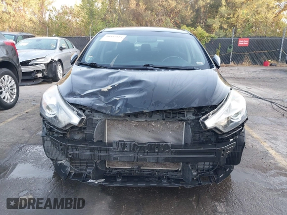 2014 Kia Forte EX with VIN KNAFX4A8XE5121630, listed as a IAAI auction lot 40517819 with 144,087 mi miles. Bid and sale history available at carsss.com. Image 6.