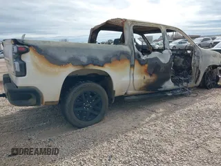 2023 Chevrolet Silverado 1500 LT Trail Boss with VIN 3GCUDFE85PG210977, listed as a IAAI auction lot 41017747 with Not Provided miles and . Bid and sale history available at DreamBid. Image 4.