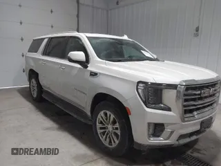 2021 GMC Yukon XL SLT with VIN 1GKS2GKD4MR414318, listed as a IAAI auction lot 41590618 with 49,913 mi miles. Bid and sale history available at carsss.com. Image 1.