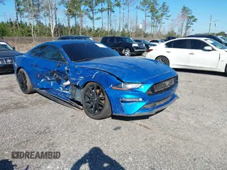 2021 Ford Mustang GT with VIN 1FA6P8CF7M5152781, listed as a IAAI auction lot 41632697 with 74,789 mi miles. Bid and sale history available at carsss.com. Image 1.