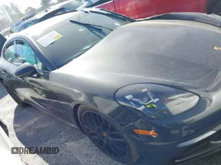 2018 Porsche Panamera with VIN WP0AA2A79JL101949, listed as a IAAI auction lot 41131003 with 53,641 mi miles and . Bid and sale history available at DreamBid. Image 1.