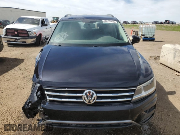 2018 Volkswagen Tiguan S z VIN 3VV0B7AX7JM157409, wystawiony jako Copart lot #58670225 z przebiegiem 162 204 mil mil oraz Nie do naprawy • Non repairable. Historia ofert i sprzedaży dostępna na DreamBid. Obrazek 5.