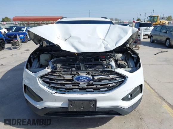 2020 Ford Edge SE z VIN 2FMPK3G92LBA35135, wystawiony jako IAAI lot #41851720 z przebiegiem 49 534 mil mil oraz . Historia ofert i sprzedaży dostępna na DreamBid. Obrazek 13.