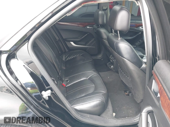 2011 Cadillac CTS Luxury with VIN 1G6DF5EYXB0103430, listed as a IAAI auction lot 42105337 with 205,069 mi miles and . Bid and sale history available at DreamBid. Image 8.