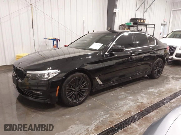 2018 BMW 5 Series 530i with VIN WBAJA5C52JWA37569, listed as a IAAI auction lot 41240799 with 80,116 mi miles and . Bid and sale history available at DreamBid. Image 2.