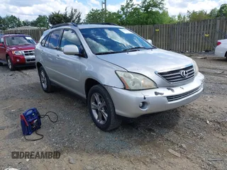 2007 Lexus RX 400h with VIN JTJGW31U672001021, listed as a IAAI auction lot 42209431 with 245,653 mi miles and . Bid and sale history available at DreamBid. Image 1.