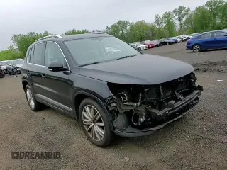 2013 Volkswagen Tiguan SE z VIN WVGBV7AX6DW550316, wystawiony jako Copart lot #56964595 z przebiegiem 157 526 mil mil oraz Szkoda całkowita • Salvage title. Historia ofert i sprzedaży dostępna na DreamBid. Obrazek 14.