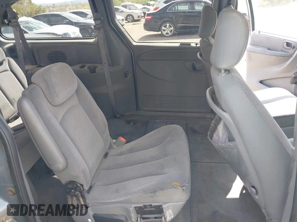 2005 Dodge Caravan SXT with VIN 2D4GP44L75R193138, listed as a IAAI auction lot 42073429 with 206,915 mi miles and . Bid and sale history available at DreamBid. Image 8.