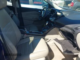 2015 Ford Escape Titanium with VIN 1FMCU0J93FUC20745, listed as a IAAI auction lot 41781551 with 174,538 mi miles and . Bid and sale history available at DreamBid. Image 5.