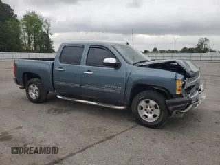 2013 Chevrolet Silverado 1500 LT with VIN 3GCPCSE02DG153586, listed as a Copart auction lot 51762165 with 149,659 mi miles and Salvage Title. Bid and sale history available at DreamBid. Image 4.
