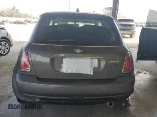 2006 MINI Hardtop with VIN WMWRC33526TK15620, listed as a Copart auction lot 54130715 with 116,981 mi miles and Salvage title. Bid and sale history available at DreamBid. Image 6.