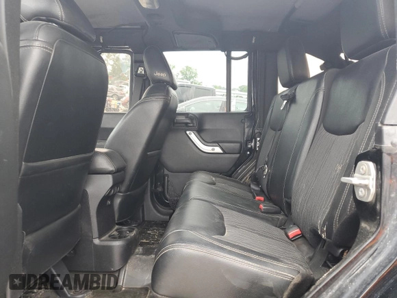 2015 Jeep Wrangler Unlimited Freedom with VIN 1C4BJWDG6FL568583, listed as a Copart auction lot 54266315 with Not provided miles and Salvage title. Bid and sale history available at DreamBid. Image 11.
