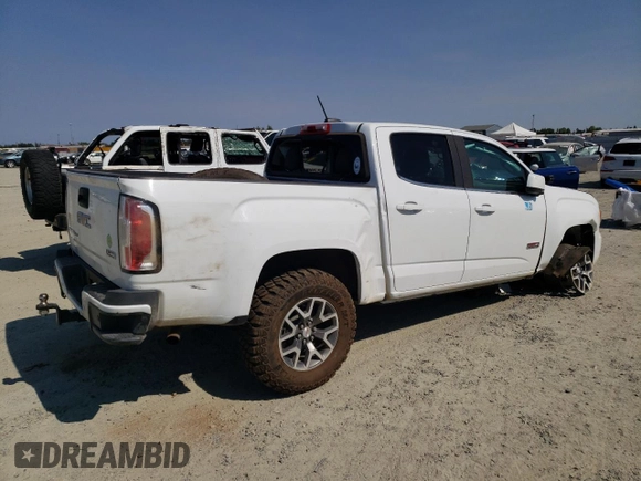 2019 GMC Canyon 4WD All Terrain w/Cloth with VIN 1GTG6FEN8K1138189, listed as a Copart auction lot 65260244 with 143,438 mi miles and Salvage Title. Bid and sale history available at carsss.com. Image 3.