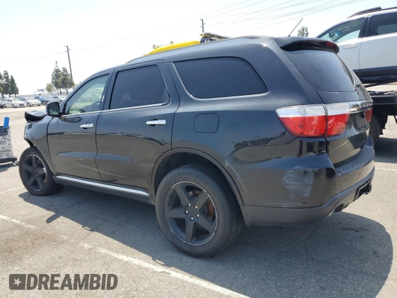 2013 Dodge Durango Citadel with VIN 1C4SDJET9DC505111, listed as a Copart auction lot 59810335 with 135,169 mi miles and Salvage title. Bid and sale history available at DreamBid. Image 2.
