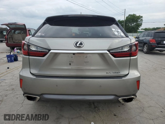 2017 Lexus RX 350 z VIN 2T2BZMCA2HC069523, wystawiony jako Copart lot #61055415 z przebiegiem 108 772 mil mil oraz Szkoda całkowita • Salvage title. Historia ofert i sprzedaży dostępna na DreamBid. Obrazek 6.