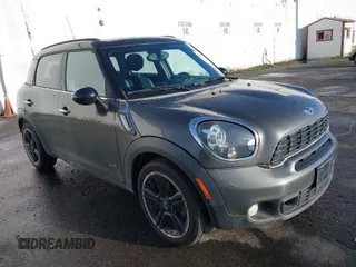 2012 MINI Countryman S with VIN WMWZC5C54CWL57991, listed as a IAAI auction lot 41079830 with 136,028 mi miles and . Bid and sale history available at DreamBid. Image 1.