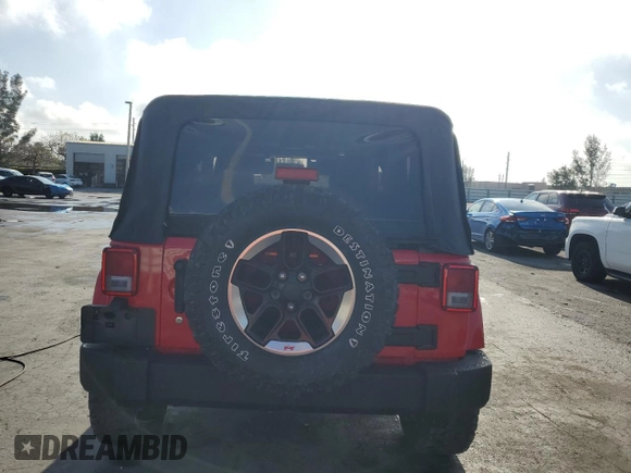 2011 Jeep Wrangler Sport with VIN 1J4AA2D17BL628066, listed as a Copart auction lot 51524285 with 105,854 mi miles and Clean Title. Bid and sale history available at carsss.com. Image 6.