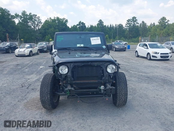 2017 Jeep Wrangler Sport z VIN 1C4AJWAG0HL618140, wystawiony jako IAAI lot #42582104 z przebiegiem 77 883 mil mil oraz . Historia ofert i sprzedaży dostępna na DreamBid. Obrazek 13.