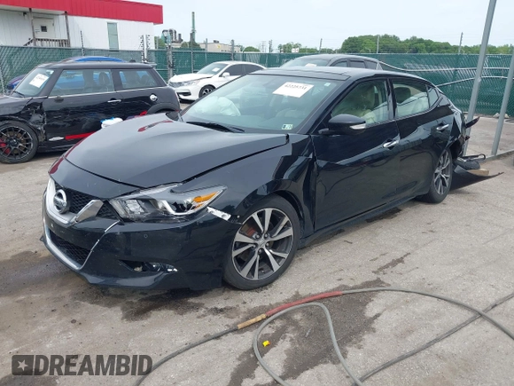 2017 Nissan Maxima Platinum with VIN 1N4AA6AP2HC404319, listed as a IAAI auction lot 42225731 with 156,833 mi miles and . Bid and sale history available at DreamBid. Image 2.