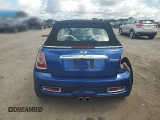 2015 MINI Convertible S with VIN WMWZP3C59F2A91231, listed as a Copart auction lot 59296415 with 31,642 mi miles and Salvage title. Bid and sale history available at DreamBid. Image 6.