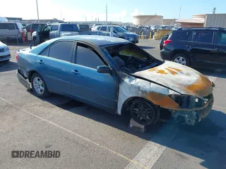 2002 Toyota Camry LE z VIN JTDBE32K620075430, wystawiony jako IAAI lot #42035100 z przebiegiem Nie podano mil oraz . Historia ofert i sprzedaży dostępna na DreamBid. Obrazek 1.