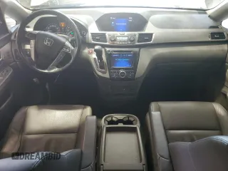 2016 Honda Odyssey Touring Elite with VIN 5FNRL5H91GB070424, listed as a Copart auction lot 55583075 with 115,709 mi miles and Salvage Title. Bid and sale history available at DreamBid. Image 8.