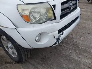 2006 Toyota Tacoma PreRunner z VIN 5TEJU62N06Z284114, wystawiony jako IAAI lot #41285658 z przebiegiem 92 160 mil mil oraz . Historia ofert i sprzedaży dostępna na DreamBid. Obrazek 6.