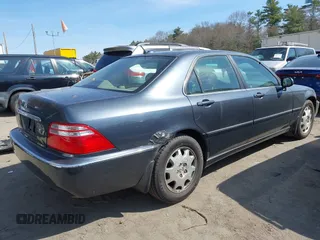 2004 Acura RL w/Navigation System with VIN JH4KA96634C006366, listed as a IAAI auction lot 42054689 with 350,809 mi miles. Bid and sale history available at carsss.com. Image 4.