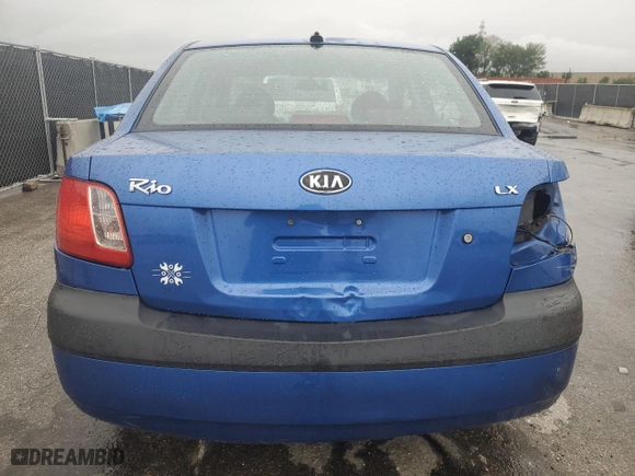 2009 Kia Rio SX with VIN KNADE223896572348, listed as a Copart auction lot 51949235 with 161,546 mi miles and Salvage Title. Bid and sale history available at carsss.com. Image 6.