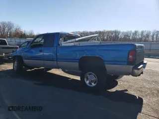 2000 Dodge Ram 2500 with VIN 1B7KF2361YJ138168, listed as a Copart auction lot 80492714 with 310,680 mi miles and Salvage Title. Bid and sale history available at carsss.com. Image 2.