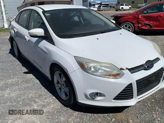 2014 Ford Focus SE with VIN 1FADP3F21EL202851, listed as a Copart auction lot 51129755 with 157,735 mi miles and Salvage Title. Bid and sale history available at carsss.com. Image 1.