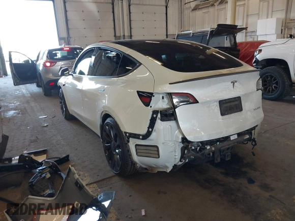 2021 Tesla Model Y Performance with VIN 5YJYGDEF4MF263473, listed as a IAAI auction lot 41851083 with 39,289 mi miles and . Bid and sale history available at DreamBid. Image 3.