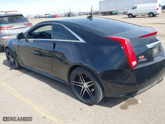 2012 Cadillac CTS Coupe with VIN 1G6DC1E33C0158695, listed as a IAAI auction lot 41752295 with 150,887 mi miles. Bid and sale history available at carsss.com. Image 3.