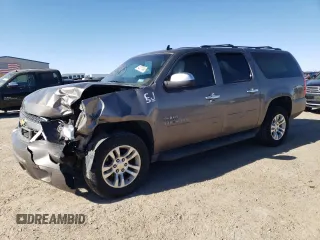 2013 Chevrolet Suburban LS with VIN 1GNSCHE01DR323733, listed as a Copart auction lot 42207495 with 147,072 mi miles and Salvage Title. Bid and sale history available at carsss.com. Image 1.