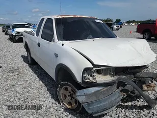 2003 Ford F-150 XL z VIN 2FTRX18WX3CA73133, wystawiony jako Copart lot #58734795 z przebiegiem 197 519 mil mil oraz Szkoda całkowita • Salvage title. Historia ofert i sprzedaży dostępna na DreamBid. Obrazek 14.