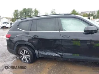 2021 Volkswagen Atlas SE z VIN 1V2DP2CA8MC524593, wystawiony jako IAAI lot #42006866 z przebiegiem 60 419 mil mil oraz . Historia ofert i sprzedaży dostępna na DreamBid. Obrazek 6.