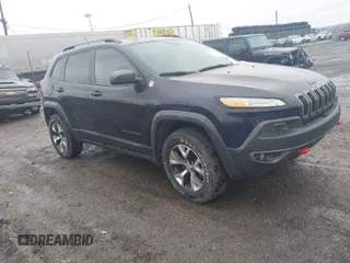 2014 Jeep Cherokee Trailhawk with VIN 1C4PJMBB5EW120432, listed as a IAAI auction lot 41973114 with 88,795 mi miles. Bid and sale history available at carsss.com. Image 1.