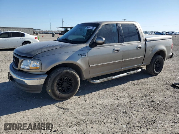 2003 Ford F-150 XLT with VIN 1FTRW07623KB92840, listed as a Copart auction lot 48603105 with 145,516 mi miles and Salvage Title. Bid and sale history available at carsss.com. Image 1.