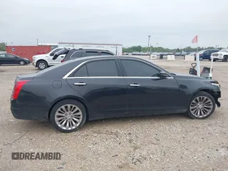2014 Cadillac CTS Luxury AWD with VIN 1G6AX5SX9E0197395, listed as a IAAI auction lot 42211452 with 90,657 mi miles and . Bid and sale history available at DreamBid. Image 13.